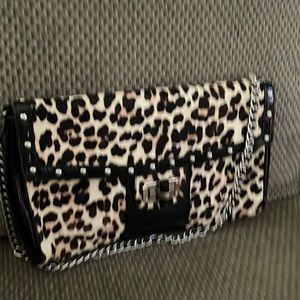black and animal print purse with chain